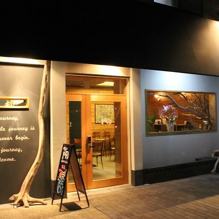 Bar And Hostel Mondo Osaka Bagian luar foto